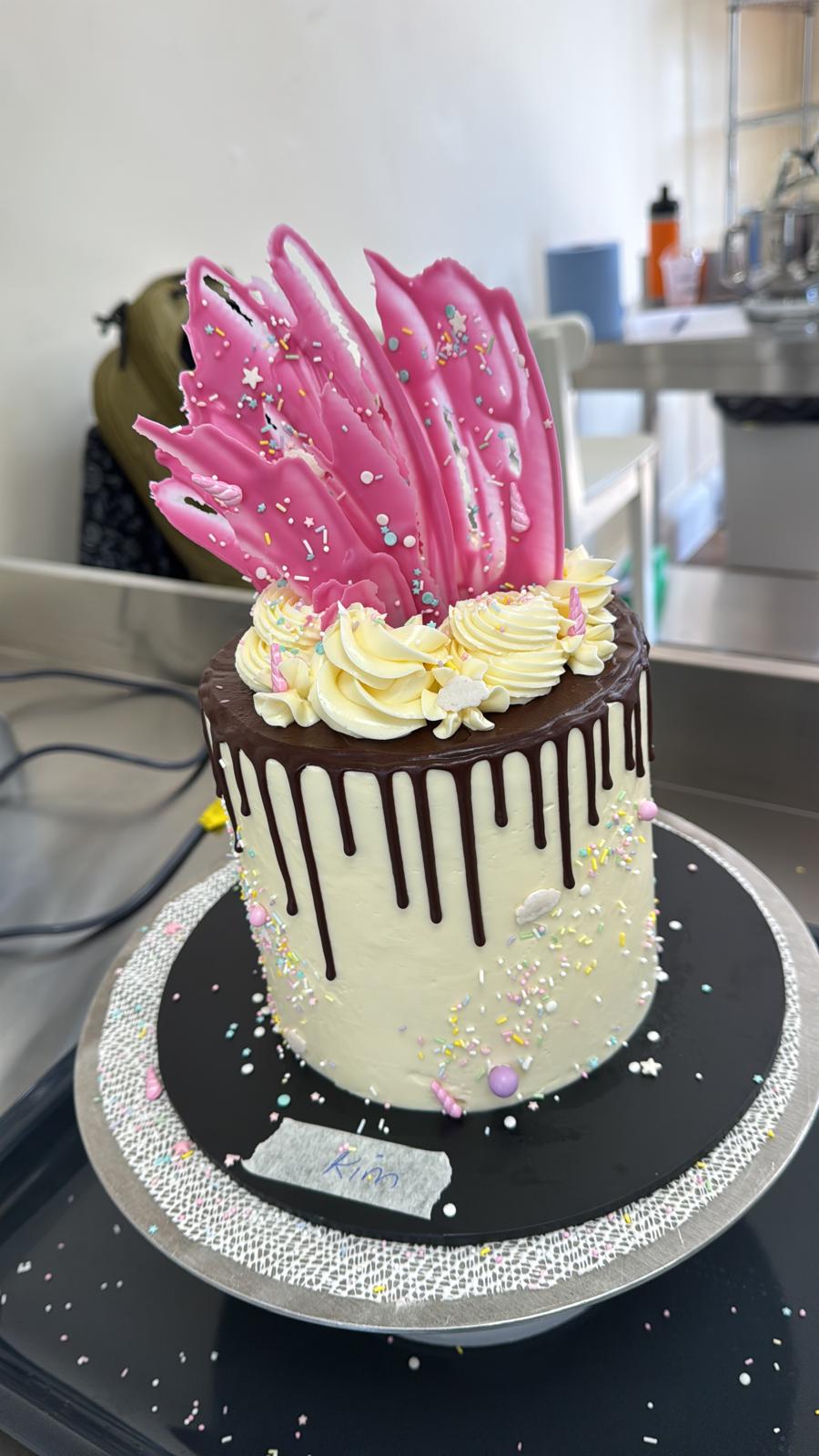 Pink chocolate-sail cake